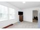 Bedroom featuring hardwood floors, a large window, and plenty of space at 4213 Stockbrook Dr, Charlotte, NC 28215