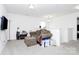 Upstairs loft area perfect for a second living room with a couch and TV at 4213 Stockbrook Dr, Charlotte, NC 28215