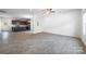 Open-concept living room with kitchen and dining areas, perfect for entertaining and modern living at 4213 Stockbrook Dr, Charlotte, NC 28215
