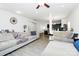 Spacious living room with wood floors, and neutral-colored sofas offering a relaxing ambiance at 4213 Stockbrook Dr, Charlotte, NC 28215