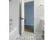 Stylish bathroom with modern floor tiles, tiled shower, and updated fixtures at 4331 Hamilton Cir, Charlotte, NC 28216