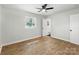 Cozy bedroom with hardwood floors and a view to an adjacent room at 4331 Hamilton Cir, Charlotte, NC 28216