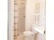 Clean bathroom with walk-in shower, modern toilet, and crisp white colors at 4343 Dowling Dr, Charlotte, NC 28205