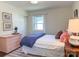 Bedroom with natural light, pink dresser, and stylish decor at 4343 Dowling Dr, Charlotte, NC 28205