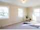 Light-filled bonus room or workout area with neutral walls, two bright windows, and ample space at 4343 Dowling Dr, Charlotte, NC 28205