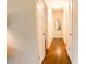 Hallway featuring hardwood floors and neutral paint throughout at 4343 Dowling Dr, Charlotte, NC 28205