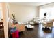 Sun-drenched living room features hardwood floors, large windows, and comfortable seating at 4343 Dowling Dr, Charlotte, NC 28205