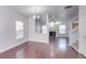 Bright and open living area with fireplace and stairs to the second floor at 5670 Hammermill Dr, Harrisburg, NC 28075