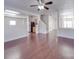 Spacious open-concept living room connected to the kitchen with stairs nearby at 5670 Hammermill Dr, Harrisburg, NC 28075