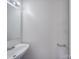 Simple powder room featuring a white vanity and faucet at 5670 Hammermill Dr, Harrisburg, NC 28075