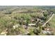 Wide aerial view of a charming home surrounded by mature trees in a beautiful rural area at 574 Pamela Rd, York, SC 29745