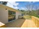 The wooden deck provides a great space for relaxing and enjoying the backyard at 574 Pamela Rd, York, SC 29745