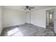 Spacious room with light gray floors leading to bathroom and walk-in closet at 574 Pamela Rd, York, SC 29745