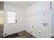 Bright mudroom with tile flooring, door to the outside, and shelving at 5962 Charlie Walker Rd, Kannapolis, NC 28081