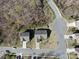 Aerial view of a home showing the roof, driveway, and proximity to other homes at 7283 Bradberry Ln, Denver, NC 28037
