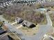 Aerial view of a home showing proximity to community pool and other homes at 7283 Bradberry Ln, Denver, NC 28037