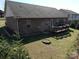 Home backyard with wooden deck, lawn, and room for outdoor entertaining at 7283 Bradberry Ln, Denver, NC 28037