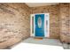 Inviting blue front door with sidelights and decorative glass at 7283 Bradberry Ln, Denver, NC 28037