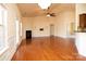 Spacious living room with fireplace, hardwood floors and backyard access at 7283 Bradberry Ln, Denver, NC 28037