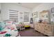 Charming bedroom with hardwood floors, colorful decor, and a cozy atmosphere at 7924 Creek Park Dr, Denver, NC 28037
