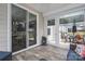 Inviting patio space with tile flooring, comfortable seating, and easy access to both indoor and outdoor areas at 7924 Creek Park Dr, Denver, NC 28037