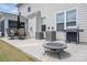 Outdoor patio with seating, barbecue, and fire pit at 7924 Creek Park Dr, Denver, NC 28037