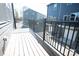 Private balcony with black metal railing and views of surrounding neighborhood at 8010 Elevate Ct, Charlotte, NC 28205