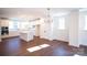 Bright and open kitchen with white cabinetry, stainless appliances, and a large island for entertaining at 8010 Elevate Ct, Charlotte, NC 28205