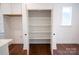 Walk-in pantry with ample shelving providing lots of storage space at 8010 Elevate Ct, Charlotte, NC 28205