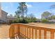 Backyard view from a wooden deck overlooking a grassy area and mature trees at 816 S Confederate Ave, Rock Hill, SC 29730