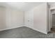 Spacious bedroom with neutral walls, plush carpeting, and a closet for storage at 816 S Confederate Ave, Rock Hill, SC 29730