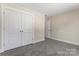 Neutral bedroom featuring a spacious closet for organization and storage solutions at 816 S Confederate Ave, Rock Hill, SC 29730