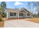 Inviting home showcasing a well-kept lawn, modern siding, and a convenient driveway at 816 S Confederate Ave, Rock Hill, SC 29730