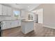 Well-designed kitchen boasting a center island, subway tile backsplash, and backyard access at 816 S Confederate Ave, Rock Hill, SC 29730