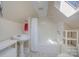 Bathroom with a standalone sink, skylight and shower/tub combination at 820 N Main St, Salisbury, NC 28144