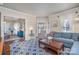 Spacious open-concept living area with hardwood floors connecting multiple rooms at 820 N Main St, Salisbury, NC 28144