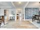 Spacious foyer with hardwood flooring, designer wallpaper and elegant decor at 822 Flatwater Ct, Fort Mill, SC 29708