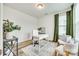 Cozy home office with lots of natural light, neutral decor, and versatile layout at 822 Flatwater Ct, Fort Mill, SC 29708