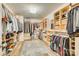 Large walk-in closet with custom shelving, ample storage for shoes, clothes, and accessories at 822 Flatwater Ct, Fort Mill, SC 29708