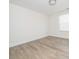 Bright bedroom features modern flooring, neutral walls, and ample natural light from the window at 8432 Strider Dr, Charlotte, NC 28212