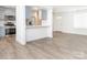 Modern kitchen with stainless steel appliances, quartz countertops, and an open view at 8432 Strider Dr, Charlotte, NC 28212