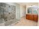 Primary bathroom featuring a large walk-in shower and a separate vanity area at 9610 Pensive Ln, Waxhaw, NC 28173