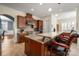 Well-appointed kitchen with stainless steel appliances, granite countertops, and eat-in island at 9610 Pensive Ln, Waxhaw, NC 28173