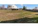 Spacious backyard with a wooden fence, offering a private outdoor space at 103 Karlyn Ct, Mooresville, NC 28115