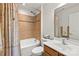 Cozy bathroom with a combined shower and tub, tiled walls, and a vanity with storage, offering a functional space at 103 Karlyn Ct, Mooresville, NC 28115