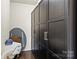 Closet with custom dark wood built-ins, offering ample storage space at 103 Karlyn Ct, Mooresville, NC 28115