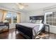 Spacious main bedroom with hardwood floors and generous natural light at 103 Karlyn Ct, Mooresville, NC 28115