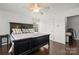 Main bedroom featuring dark wood floors and neutral-toned decor at 103 Karlyn Ct, Mooresville, NC 28115