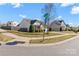 Corner lot home with manicured front lawn and landscaping at 103 Karlyn Ct, Mooresville, NC 28115