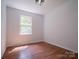 Bright bedroom with wood floors, natural light, and neutral walls create a serene space at 105 Timber Ridge Rd, Belmont, NC 28012